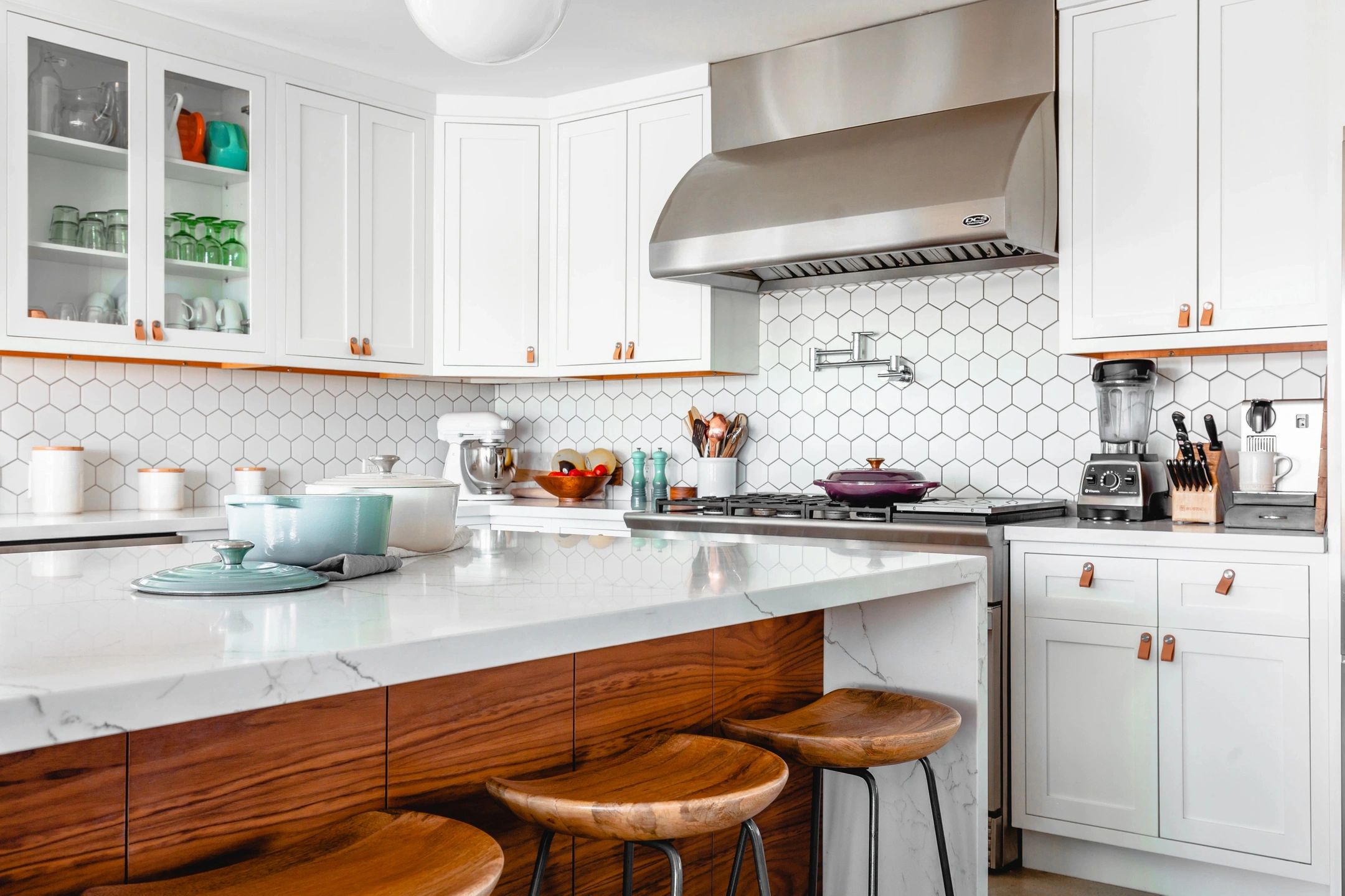 Bright kitchen with copper hardware